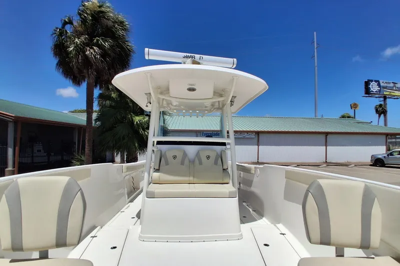 Slide: The Image of 2020 Century 3200 Center Console boat with seating, under clear blue sky. - 8