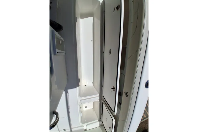 Slide: The Image of 2020 Century 3200 Center Console boat storage compartments, open and spacious design. - 20
