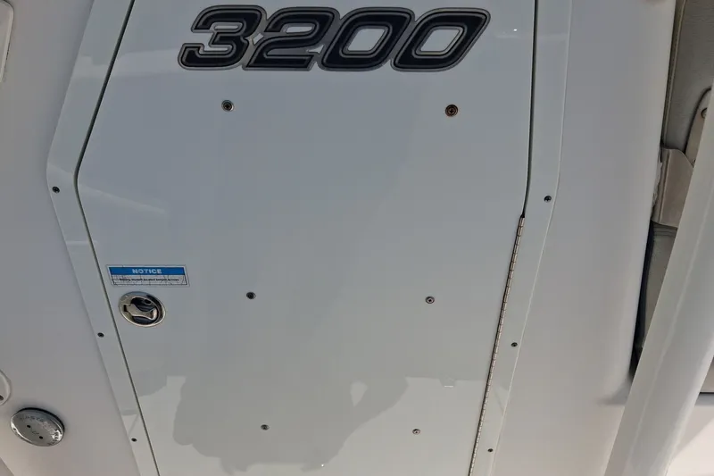 Slide: The Image of Century 3200 Center Console 2020 boat panel with model number and notice label. - 7
