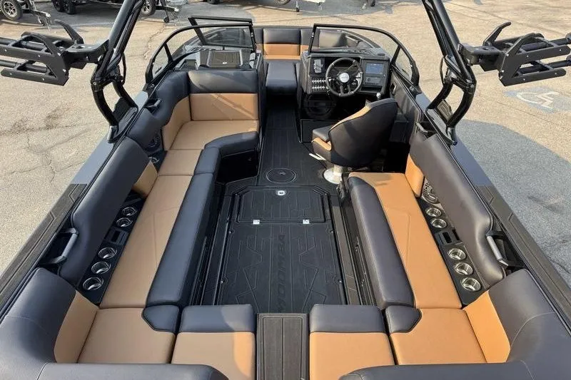 Slide: The Image of Luxurious interior of 2027 Moomba Tykon boat with spacious seating and modern dashboard. - 18