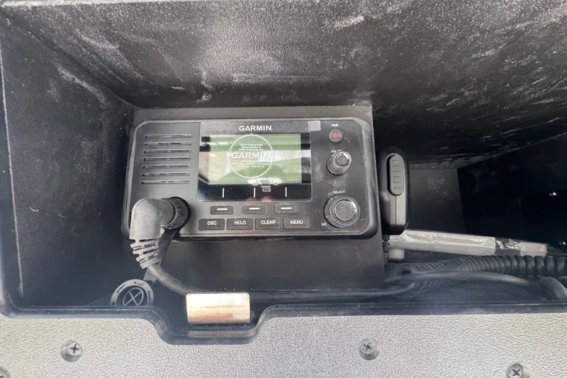 Slide: The Image of Garmin marine radio installed in 2027 Caymas 281 HB boat dashboard. - 38