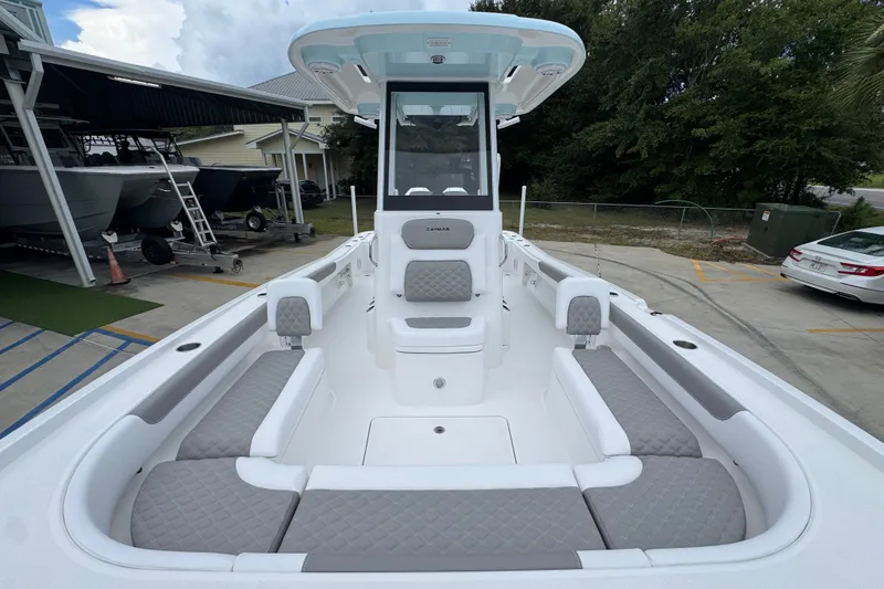 Slide: The Image of 2027 Caymas 281 HB boat interior with spacious seating and modern design. - 27