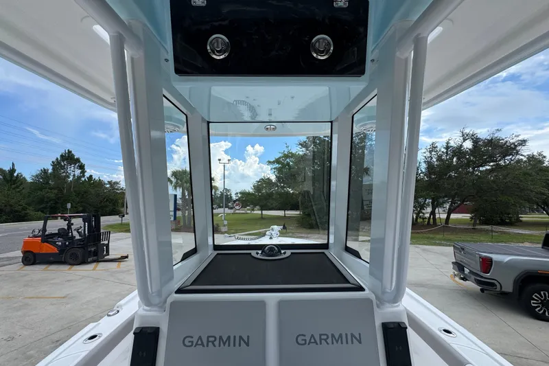 Slide: The Image of Interior view of 2027 Caymas 281 HB boat with Garmin navigation system. - 37