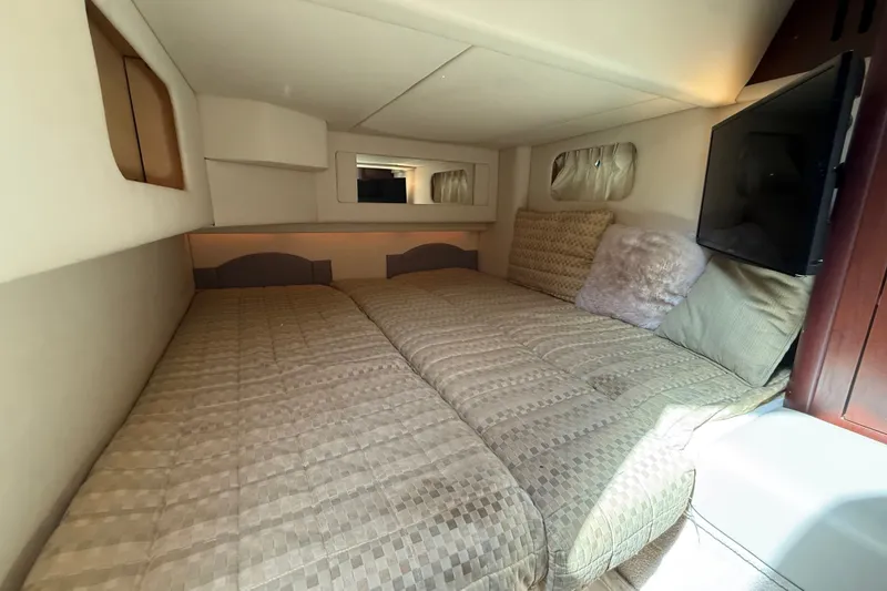 Slide: The Image of Luxurious cabin interior of 2008 Sea Ray 44 Sedan Bridge yacht with cozy bedding. - 47
