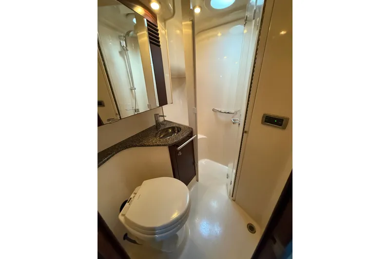 Slide: The Image of Luxurious bathroom in 2008 Sea Ray 44 Sedan Bridge yacht with modern fixtures. - 41