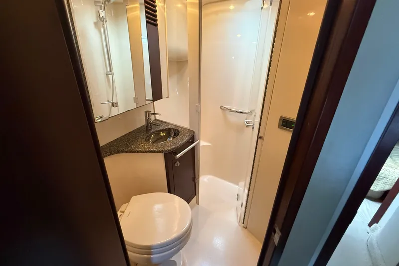 Slide: The Image of Bathroom interior of 2008 Sea Ray 44 Sedan Bridge yacht, featuring sink and shower. - 42