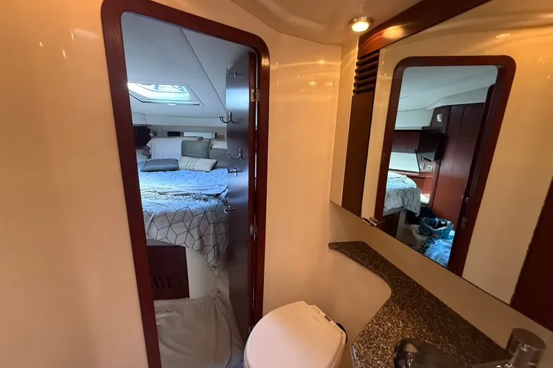 Slide: The Image of Luxurious 2008 Sea Ray 44 Sedan Bridge interior with bedroom and bathroom view. - 46