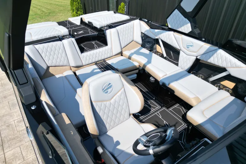 Slide: The Image of Luxurious interior of 2027 Tige Z1 boat with modern seating and sleek design. - 16