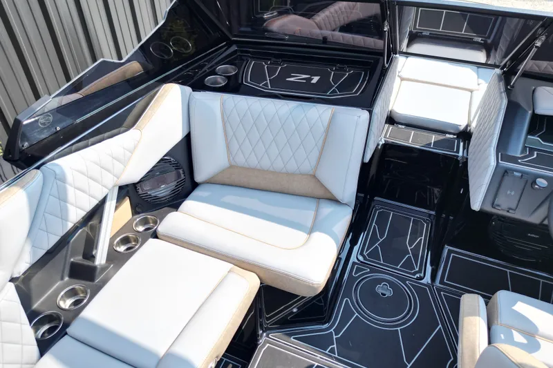 Slide: The Image of Luxurious interior of 2027 Tige Z1 boat with stylish seating and modern design. - 7