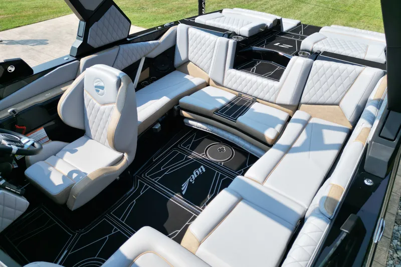 Slide: The Image of Luxurious interior of 2027 Tige Z1 boat with plush seating and modern design. - 14