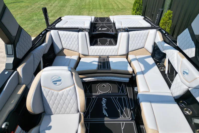 Slide: The Image of Luxurious interior of 2027 Tige Z1 boat with quilted seating and modern design. - 15