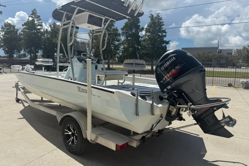 Slide: The Image of 2021 Excel 203 Bay Pro boat with Yamaha outboard motor on trailer. - 4