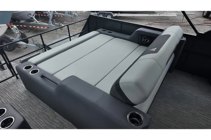 Slide: The Image of Luxurious seating area on 2027 Viaggio X22S boat with cup holders and sleek design. - 14