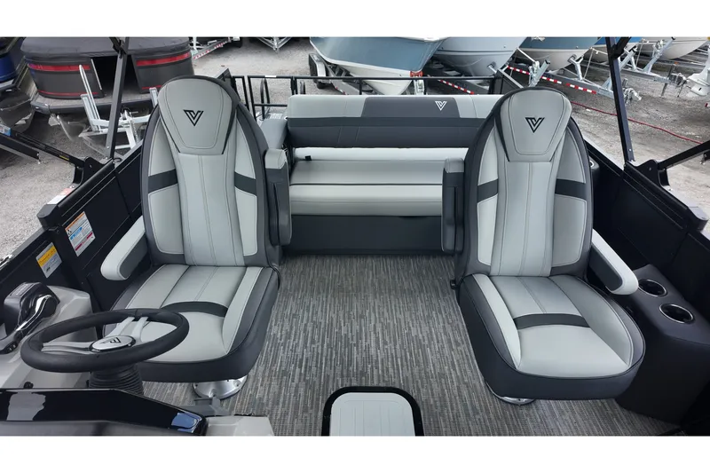 Slide: The Image of Interior of 2027 Viaggio X22S boat with modern seating and steering wheel. - 11