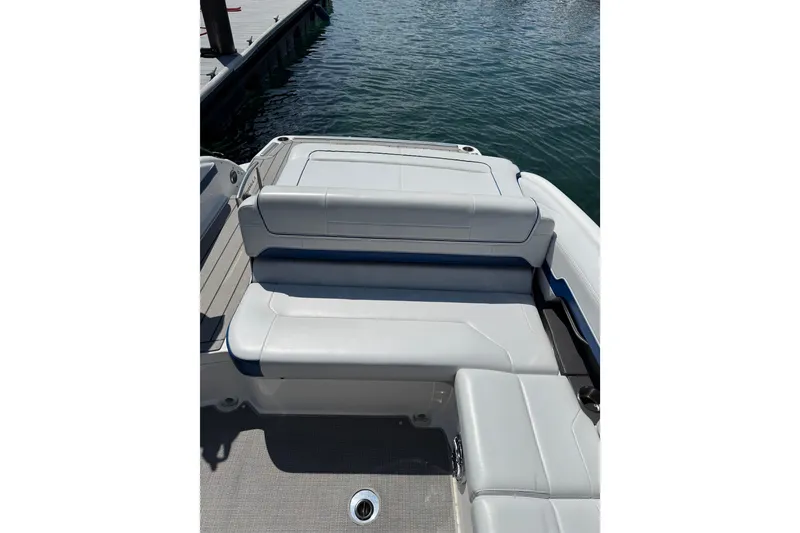Slide: The Image of 2022 Formula 270 Bowrider boat interior with sleek seating and water view. - 16