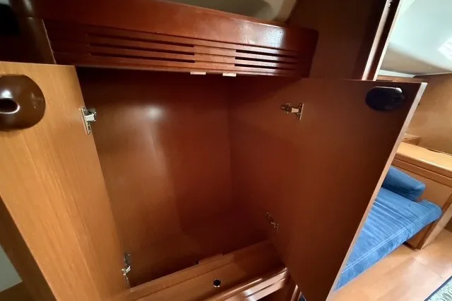 Slide: The Image of Empty wooden cabinet inside 2008 Beneteau Oceanis 46 yacht interior. - 48