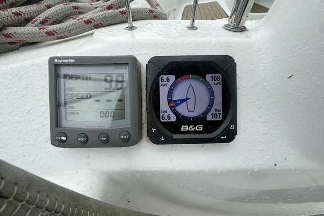 Slide: The Image of Sailing instruments on a 2008 Beneteau Oceanis 46, displaying depth and wind data. - 20