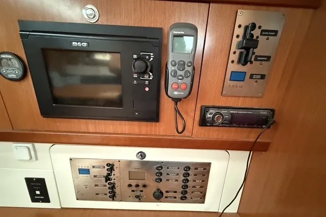 Slide: The Image of Control panel of a 2008 Beneteau Oceanis 46 yacht with navigation equipment. - 41