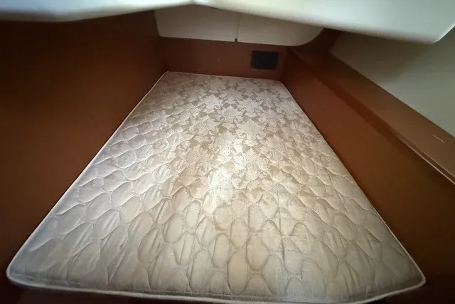 Slide: The Image of Beneteau Oceanis 46 (2008) cabin interior with a comfortable mattress. - 61