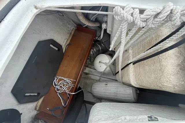 Slide: The Image of Storage compartment of a 2008 Beneteau Oceanis 46 sailboat with ropes and equipment. - 26
