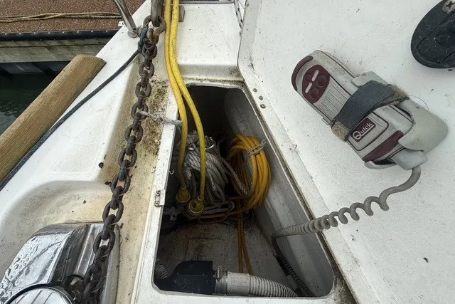 Slide: The Image of Storage compartment on a 2008 Beneteau Oceanis 46 sailboat with ropes and chains. - 8