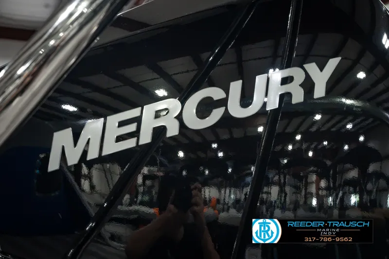 Slide: The Image of Mercury logo on 2025 Bennington L 25 Quad Bench Bowrider at Reeder Trausch Marine. - 52
