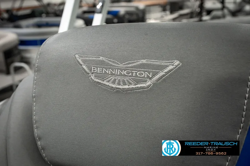Slide: The Image of 2025 Bennington L 25 Quad Bench Bowrider seat with embroidered logo detail. - 44