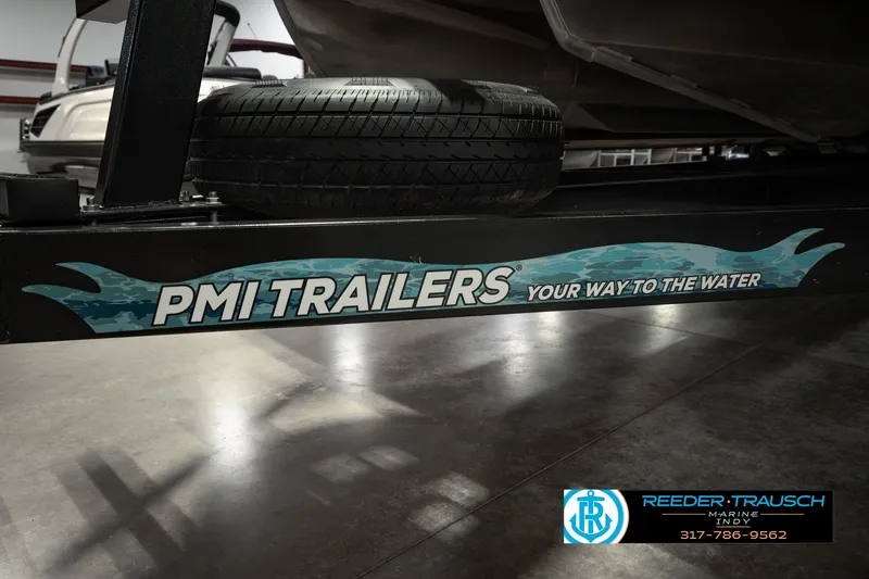 Slide: The Image of Trailer for 2025 Bennington L 25 Quad Bench Bowrider at Reeder-Trausch Marine. - 59