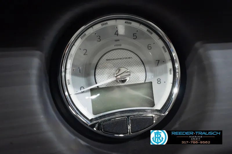 Slide: The Image of Close-up of Bennington L 25 Quad Bench Bowrider 2025 tachometer, displaying RPM gauge. - 39