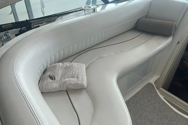 Slide: The Image of Luxurious seating area on a 2001 Cruisers Yachts 4270 Express boat. - 14