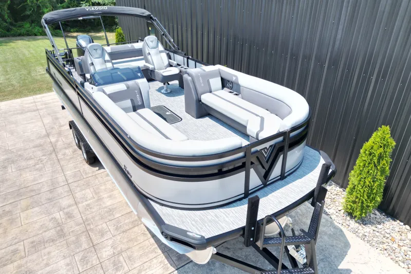 Slide: The Image of 2027 Viaggio Lago X-S 24 pontoon boat with sleek design and spacious seating. - 16