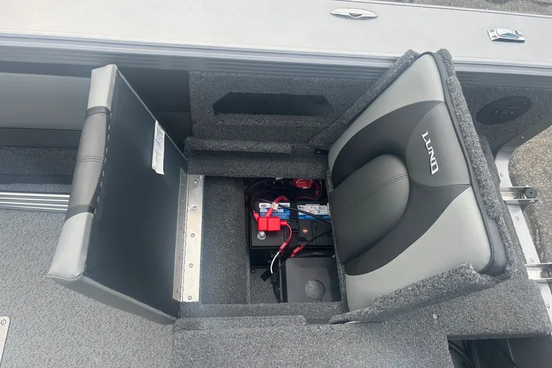 Slide: The Image of 2025 Lund 2275 Baron boat seat with storage compartment and battery. - 15
