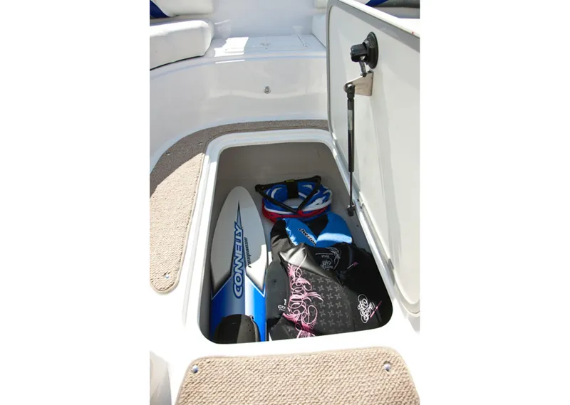 Slide: The Image of Manufacturer Provided Image: 2013 Hurricane SunDeck 187 OB storage compartment with water sports gear. - 8