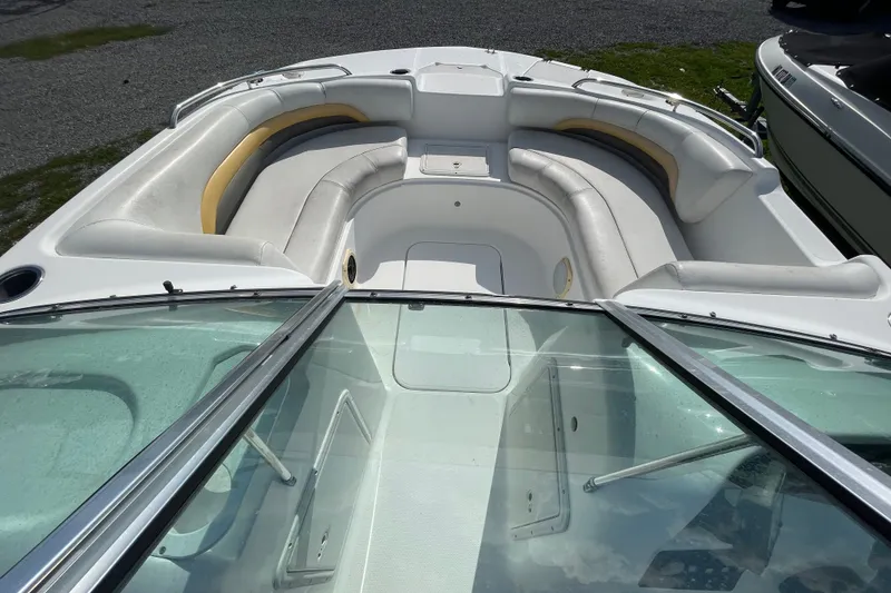 Slide: The Image of 2013 Hurricane SunDeck 187 OB boat with spacious seating and windshield view. - 2