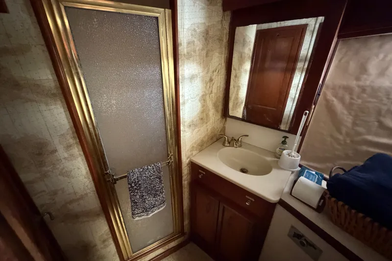 Slide: The Image of Bathroom interior of 1989 Egg Harbor 41 Convertible yacht with shower and sink. - 29