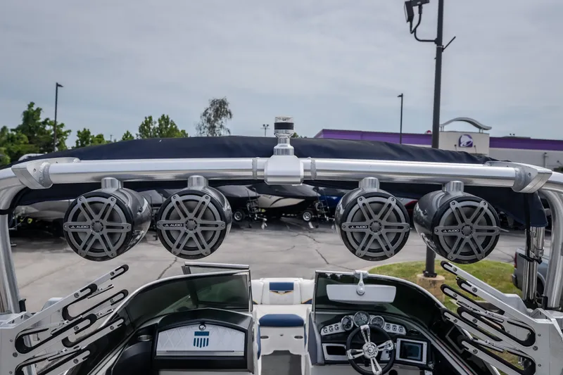 Slide: The Image of 2012 MasterCraft X55 boat with JL Audio speakers and sleek dashboard design. - 19