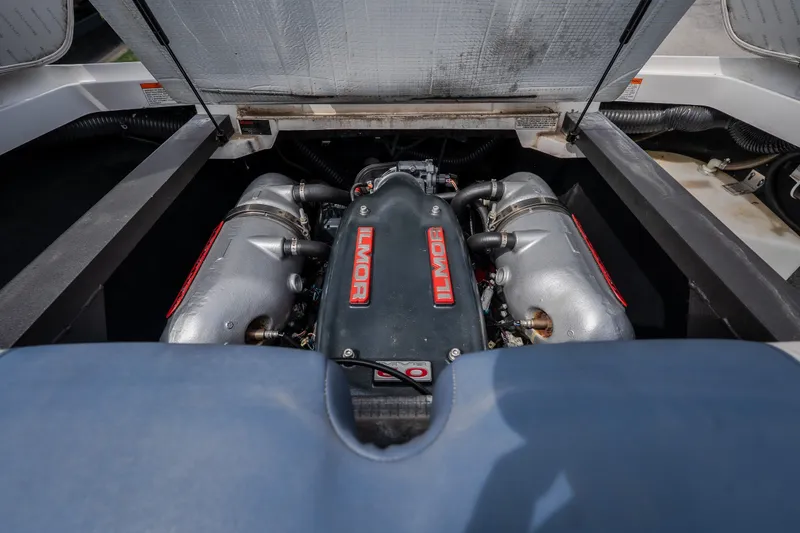 Slide: The Image of Engine compartment of a 2012 MasterCraft X55 boat featuring an Ilmor engine. - 48
