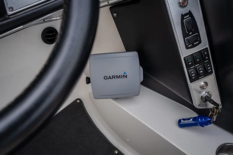 Slide: The Image of Interior of 2012 MasterCraft X55 boat with Garmin device and control panel. - 39