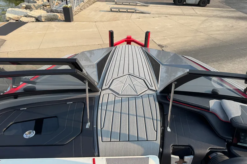 Slide: The Image of 2024 Nautique Ski Nautique boat interior with sleek design and modern dashboard. - 10