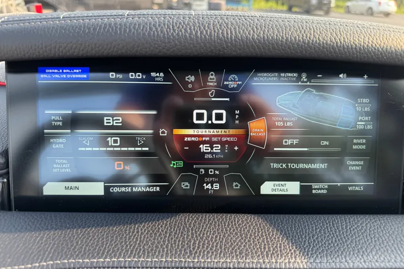 Slide: The Image of 2024 Nautique Ski Nautique dashboard display showing ballast and speed settings. - 35