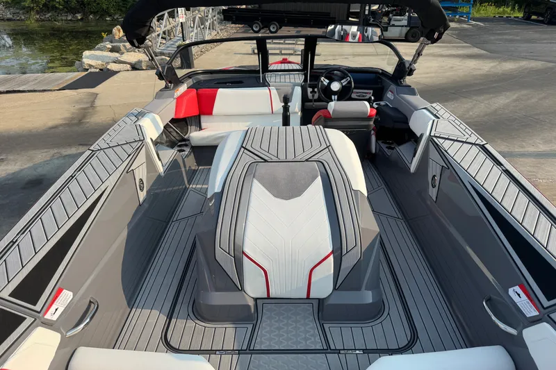 Slide: The Image of 2024 Nautique Ski Nautique boat interior with sleek seating and modern design. - 27