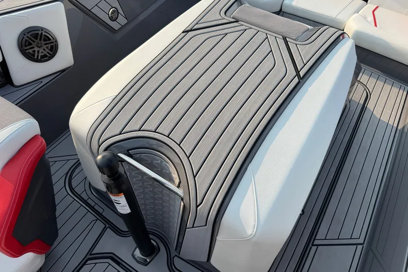 Slide: The Image of 2024 Nautique Ski Nautique interior with sleek, modern seating and stylish flooring design. - 16