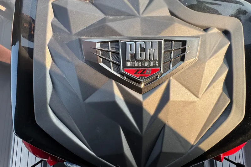 Slide: The Image of 2024 Nautique Ski Nautique PCM ZZ8 marine engine emblem close-up. - 18
