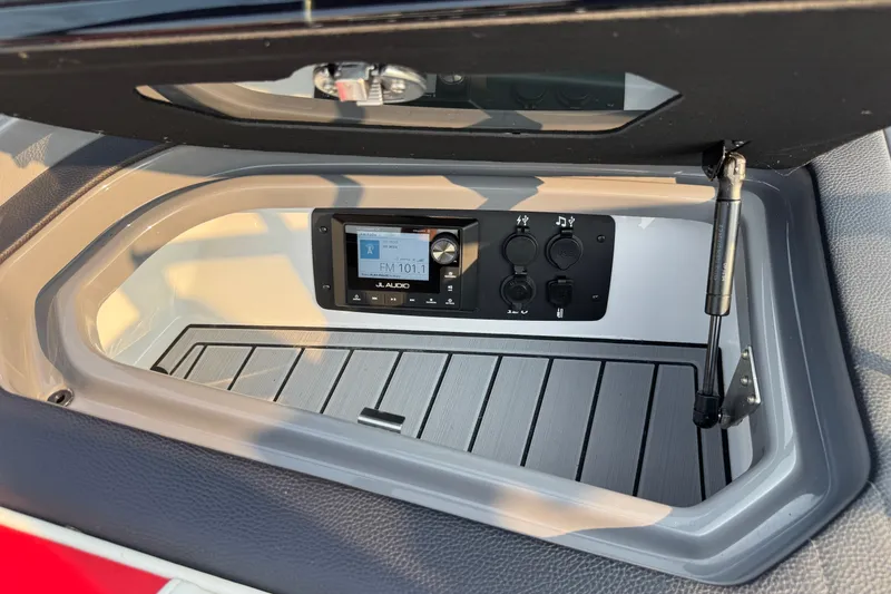 Slide: The Image of 2024 Nautique Ski Nautique audio control panel with JL Audio system. - 12