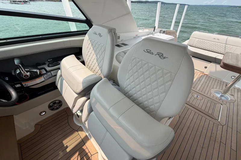 Slide: The Image of 2023 Sea Ray SLX 400 boat interior with luxurious seating and elegant design. - 22