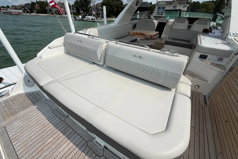 Slide: The Image of 2023 Sea Ray SLX 400 luxury boat with spacious seating and elegant design. - 32