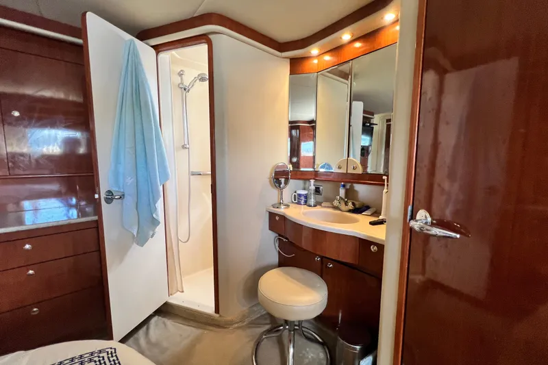 Slide: The Image of Luxurious bathroom in 2003 Sea Ray 480 Motor Yacht with vanity and shower. - 134
