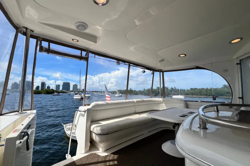 Slide: The Image of Interior view of 2003 Sea Ray 480 Motor Yacht with waterfront cityscape. - 182