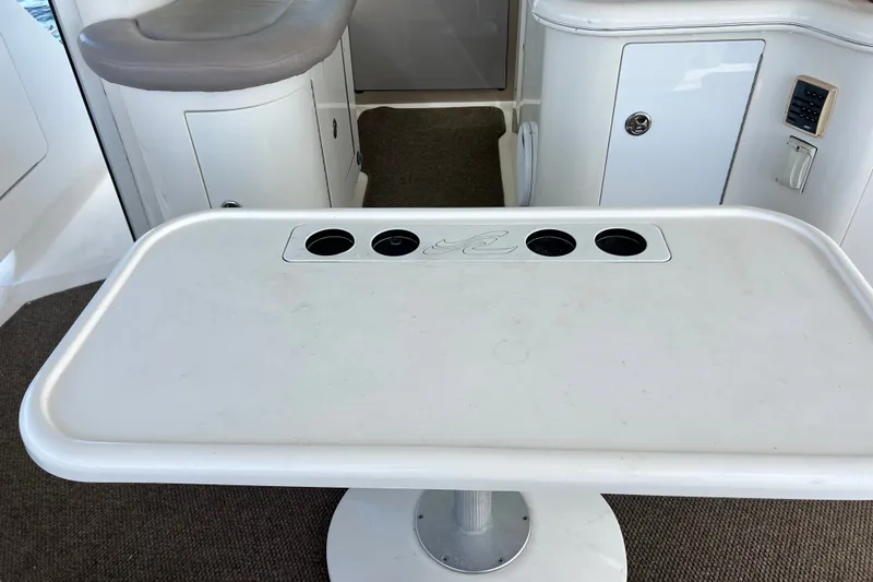 Slide: The Image of Interior of 2003 Sea Ray 480 Motor Yacht with table and seating area. - 175
