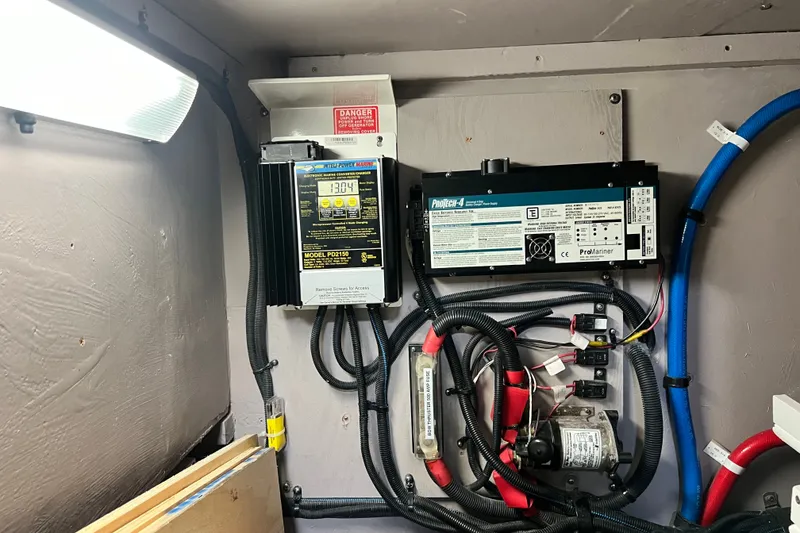 Slide: The Image of Electrical system components inside a 2003 Sea Ray 480 Motor Yacht. - 56